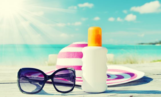 Sun lotion and sunglasses