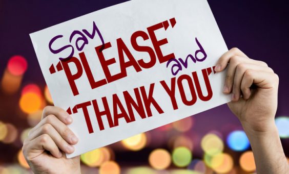 Say "Please" and "Thank You" placard with night lights on background