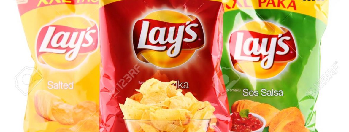 POZNAN, POLAND - OCT 25, 2017: Packets of Lay's potato chips, popular American brand founded in 1932 and owned by PepsiCo since 1965.