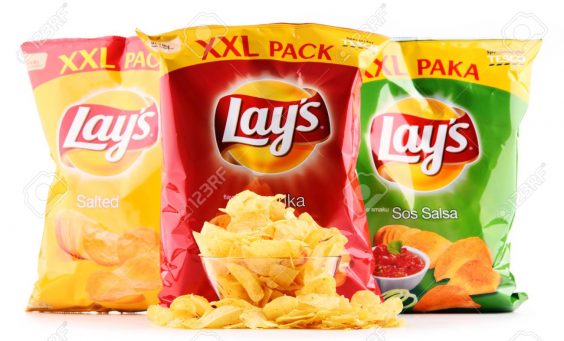 POZNAN, POLAND - OCT 25, 2017: Packets of Lay's potato chips, popular American brand founded in 1932 and owned by PepsiCo since 1965.
