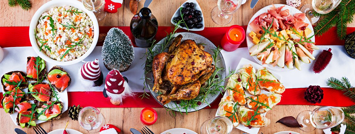 baked-turkey-christmas-dinner-christmas-table-is-served-with-turkey-decorated-with-bright-tinsel-candles-fried-chicken-table-family-dinner-top-view-flat-lay-overhead-copy-space