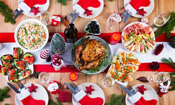 baked-turkey-christmas-dinner-christmas-table-is-served-with-turkey-decorated-with-bright-tinsel-candles-fried-chicken-table-family-dinner-top-view-flat-lay-overhead-copy-space